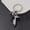 Black, variant on A Unique And Creative Golden Water Gun Keychain With Colorful Key Ring Pendant, Three-dimensional Golden Keychain Pendant.