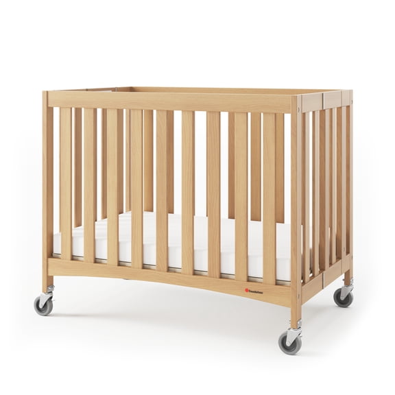Foundations Travel Sleeper Compact Folding Crib with 2" Mattress and Locking Wheels, Natural