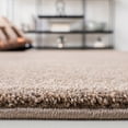 thumbnail image 3 of SAFAVIEH Plain and Solid Carleen Solid Plush Area Rug, Taupe, 5'5" x 7'7", 3 of 8