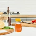 thumbnail image 5 of KAKOWELY 4pcs Empty Honey Jars Squeeze Bottles Plastic Honey Dispenser With Lids Refillable Condiment Container For Maple Syrup Ketchup Mustard Salad Dressing,3.98X"X2.17"X1.57", 5 of 5