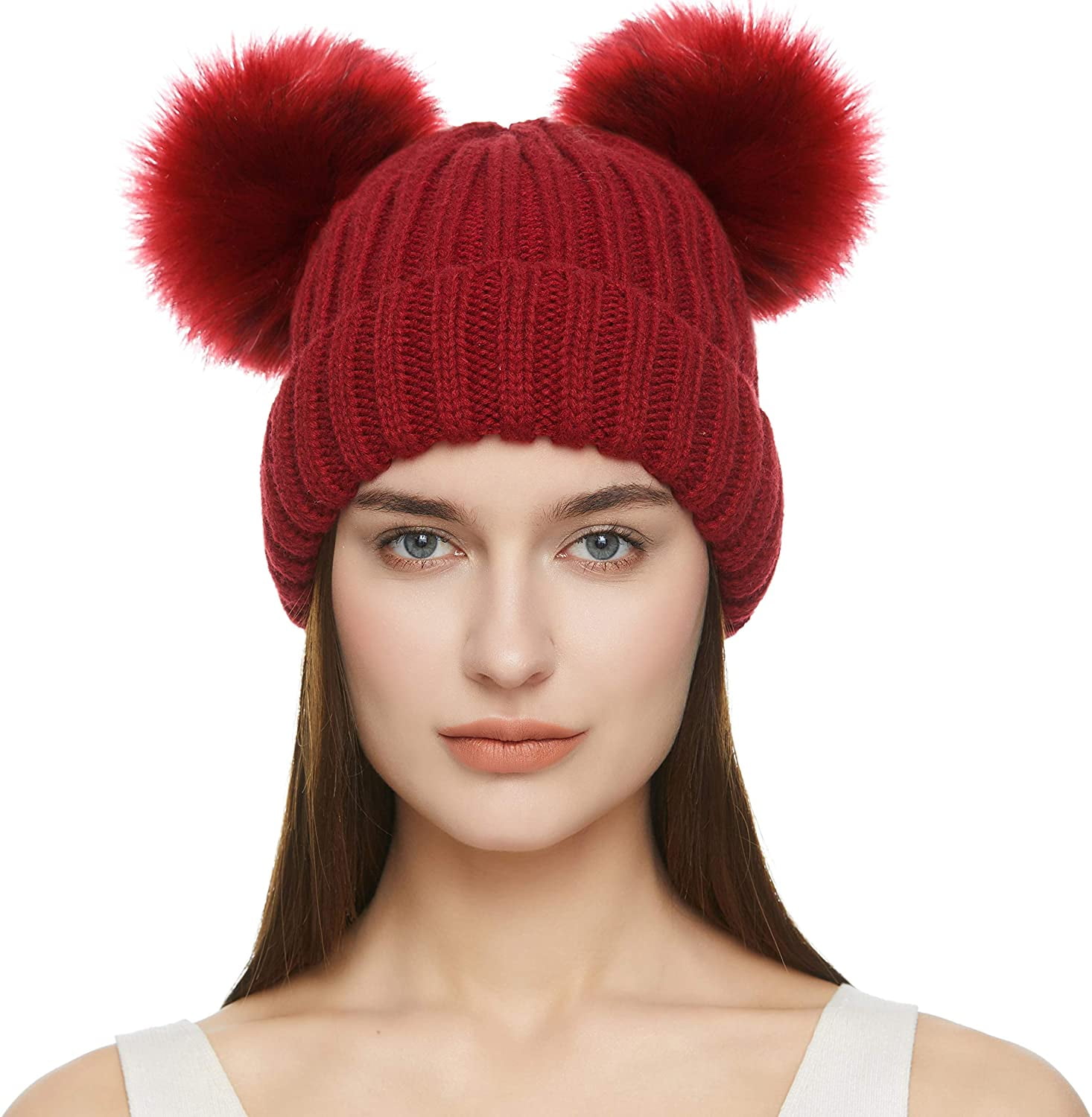 bobble hat with raccoon pom pom