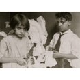 thumbnail image 2 of Young boy and young girl cutting fabric in work taken in at home in their tenement Poster Print, 2 of 4