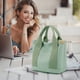 thumbnail image 4 of Bolso tote de lona con correa cruzada – Bolso de hombro ligero con múltiples bolsillos para mujer, ideal para el día a día, el trabajo o las compras, con un compartimento espacioso y confecciona, 4 of 6