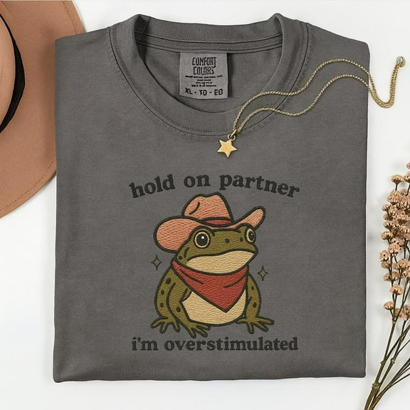 Funny Frog Embroidered Shirt – Cowboy Frog Tee with “Hold On Partner I’m Overstimulated” Quote – Comfort Colors XL Gift