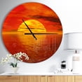 thumbnail image 1 of DesignArt Sun Falling to Yellow Ocean Large Wall Clock, 1 of 1