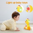 thumbnail image 2 of Juguete musical para bebés con forma de pato, Tsomtto, bailando, gateando, barriga, 2 of 6