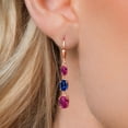 thumbnail image 3 of Gem Stone King 18K Rose Gold Plated Silver Red Created Ruby 3 Stone Dangle Earrings for Women (5.70 Cttw, Gemstone July Birthstone, Oval 8X6MM, 7X5MM and 6X4MM), 3 of 6