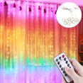 thumbnail image 1 of Cortina de luz LED, 3 * 2 m 200 luces Cortinas de arco iris que cambian de color, luces de cadena para ventana con control remoto USB, para el Día de San Valentín ACTIVE Biensenido a ACTIVE, 1 of 4
