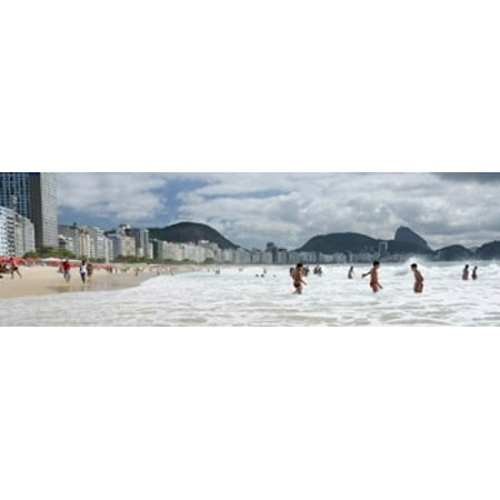 People enjoying on Copacabana Beach with Sugarloaf Mountain in background Rio De Janeiro Brazil Poster