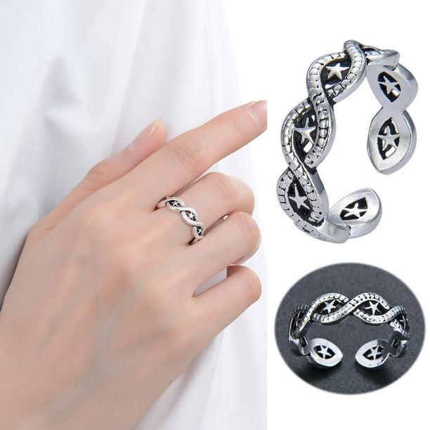 Anillo europeo retro con diseño de estrella en plata, que se puede combinar con ropa informal para crear un look más relajado