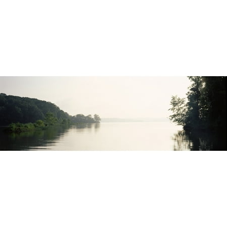 Reflection of trees in a lake at early morning Land Between the Lakes National Recreation Area Eddyville Kentucky USA Canvas Art - Panoramic Images (6 x