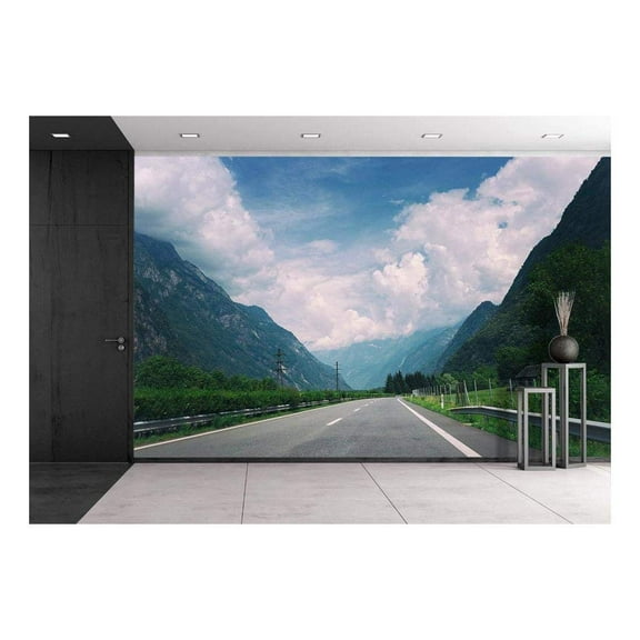 wall26 - Road in Mountain Areas Under White Clouds - Removable Wall Mural | Self-Adhesive Large Wallpaper - 100x144 inches