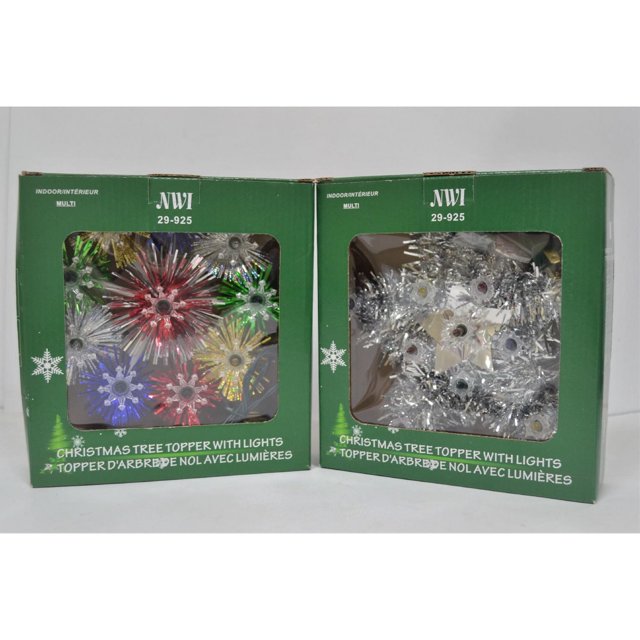 Christmas tree toppers with lights in green boxes featuring assorted multi-color starburst designs and silver tinsel stars, labeled for indoor use with bilingual English and French text, suitable for decorating holiday trees.