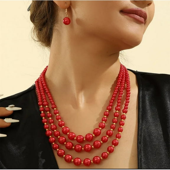 Pierced gold and red bead three strand necklace and earring set