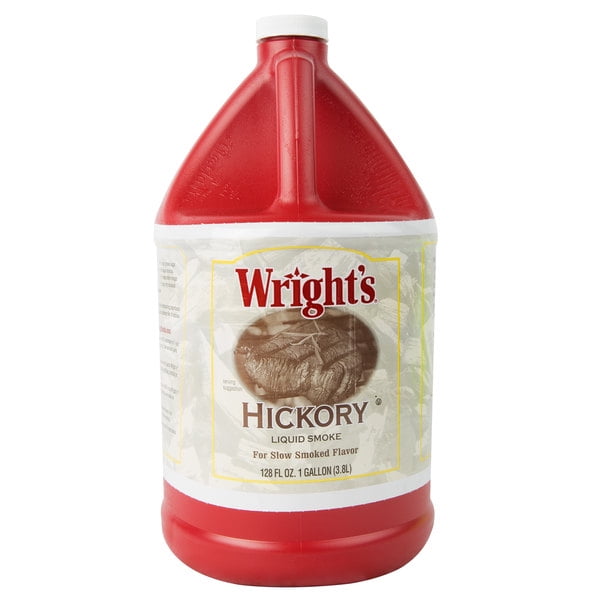 Wright's Fumée Liquide au Caryer dans une Pichet de 1 Gallon, avec un Contenant Rouge et une Étiquette Blanche Affichant le Nom de Marque et les Détails du Produit. Cet Arôme Riche et Fumé Est Idéal pour les Viandes, le BBQ, les sauces et les marinades. l'Étiquette Met en Valeur Sa Saveur Authentique de Caryer, Sa Polyvalence pour Diverses Recettes et Sa Formule Concentrée pour une Utilisation Durable.