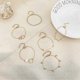thumbnail image 5 of Conjunto de pulseras geométricas sencillas con círculos, borlas de flores y hojas. Conjunto de 6 pulseras circulares., 5 of 5