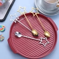 thumbnail image 3 of 2 cucharas de postre de acero inoxidable con forma de estrella hueca para café y helado., 3 of 5