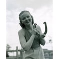 thumbnail image 2 of Portrait of young woman holding horse shoe outdoors Poster Print (18 x 24), 2 of 4