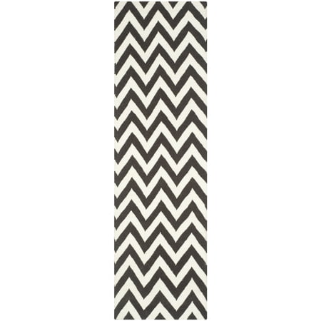 Safavieh Dhurrie Bentley Chevron Zigzag Wool Runner Rug  Brown/Ivory  2 6  x 6 Dhurries Rug Collection. Contemporary Flat Weave Rugs. The Dhurrie Collection of contemporary flat weave rugs is made using 100% pure wool and faithful obedience to the traditions of the local artisans of India. The original texture and soft coloration of antique Dhurries  so prized by collectors  is skillfully recreated in these sublime carpets. Flat weave construction and classic geometric motifs  with their natural  organic nuances in pattern and tone  are equally at home in casual  contemporary  and traditional settings.