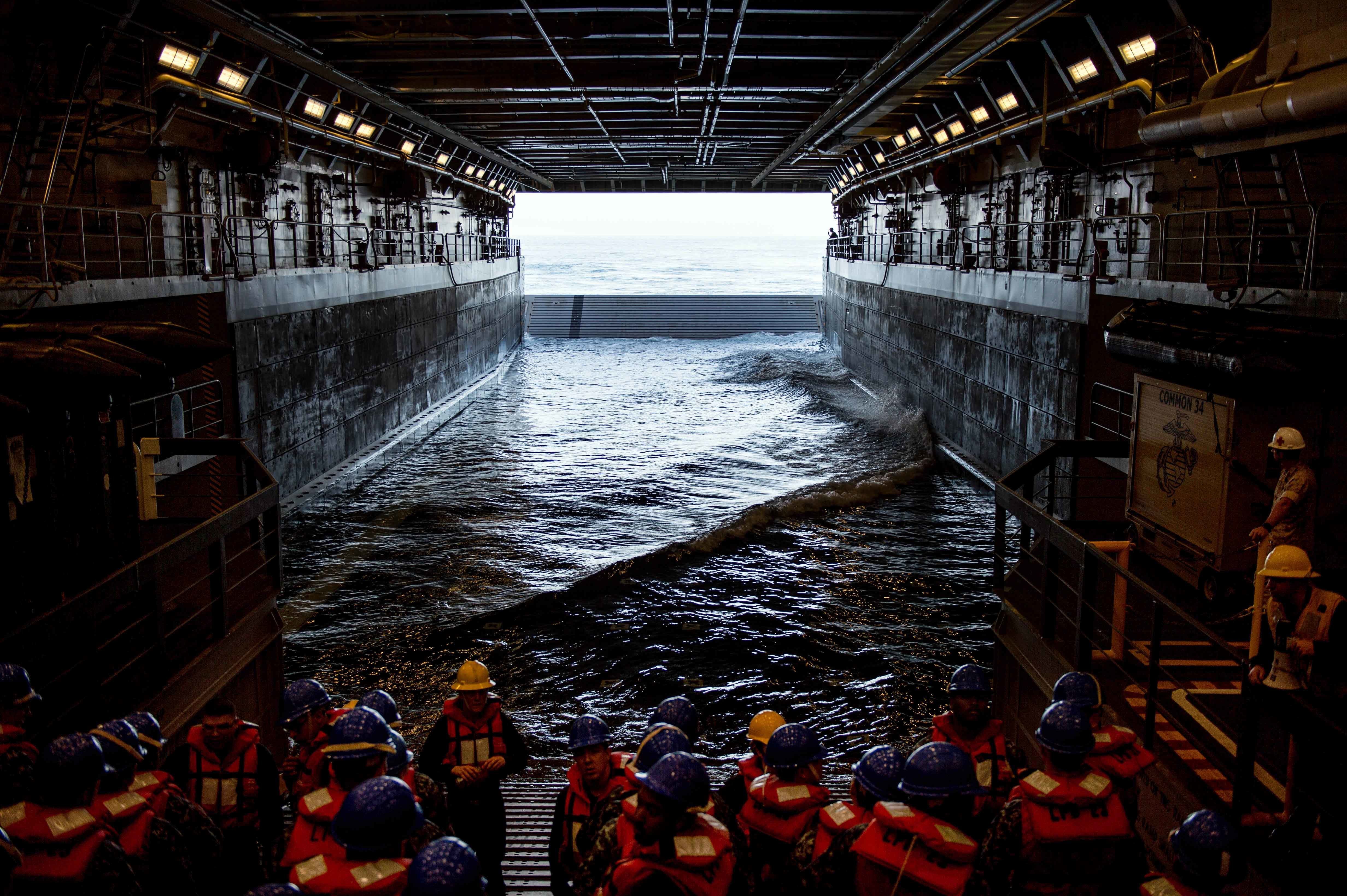 LAMINATED POSTER Sailors from San Antonio-class amphibious transport