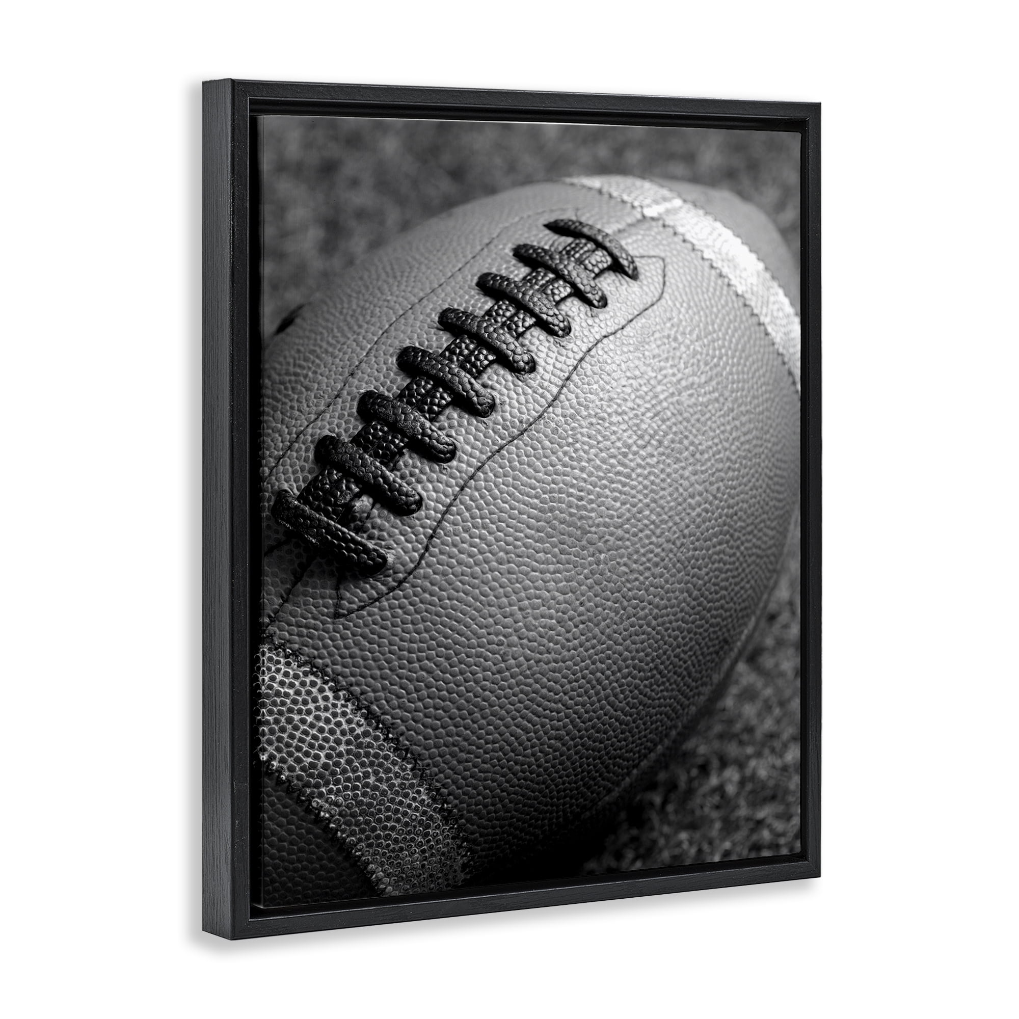 Stupell Industries Close Up Football Sports Photography Black Floater Framed Canvas Art Print Wall Art, 25 x 31
