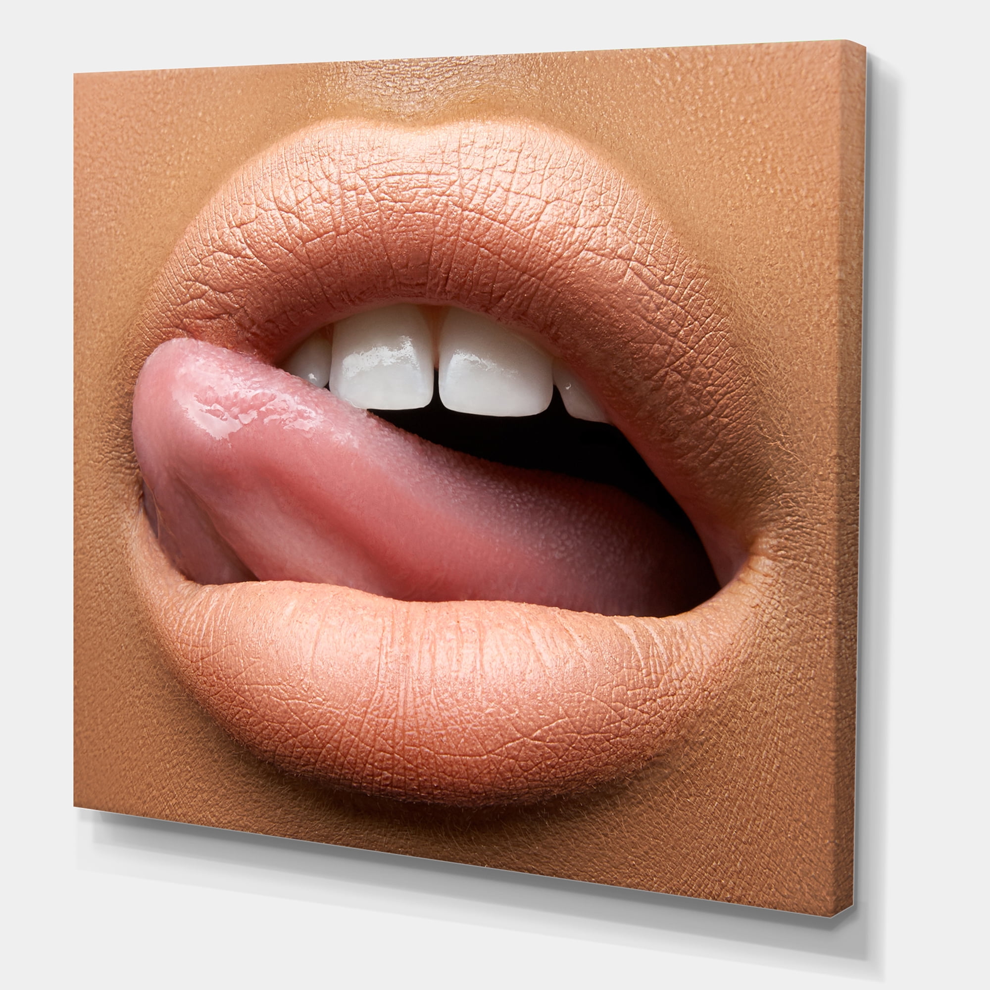 Designart ' Beautiful Dark Skinned Female Tongue Touching Lips ' Modern Canvas Wall Art Print