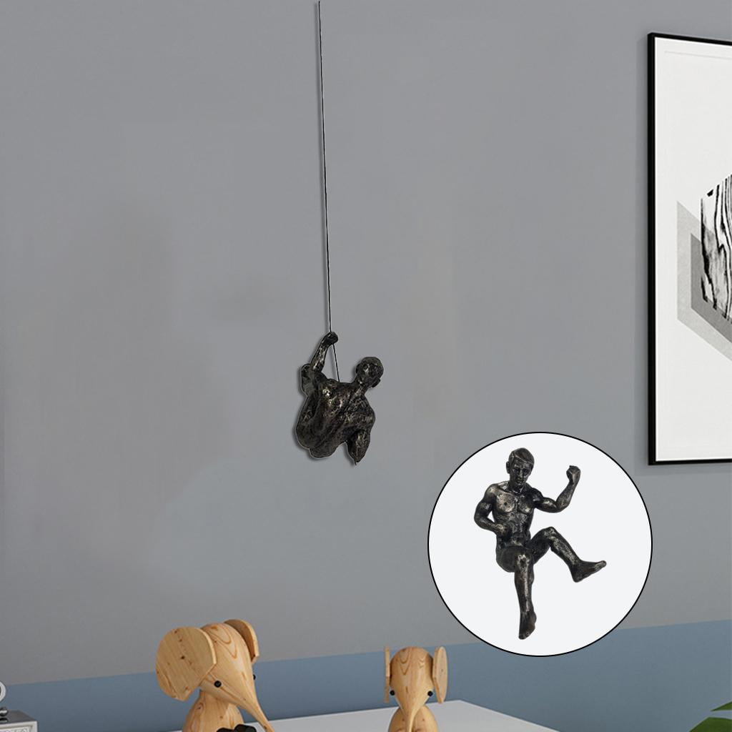 bronze abseiling figures