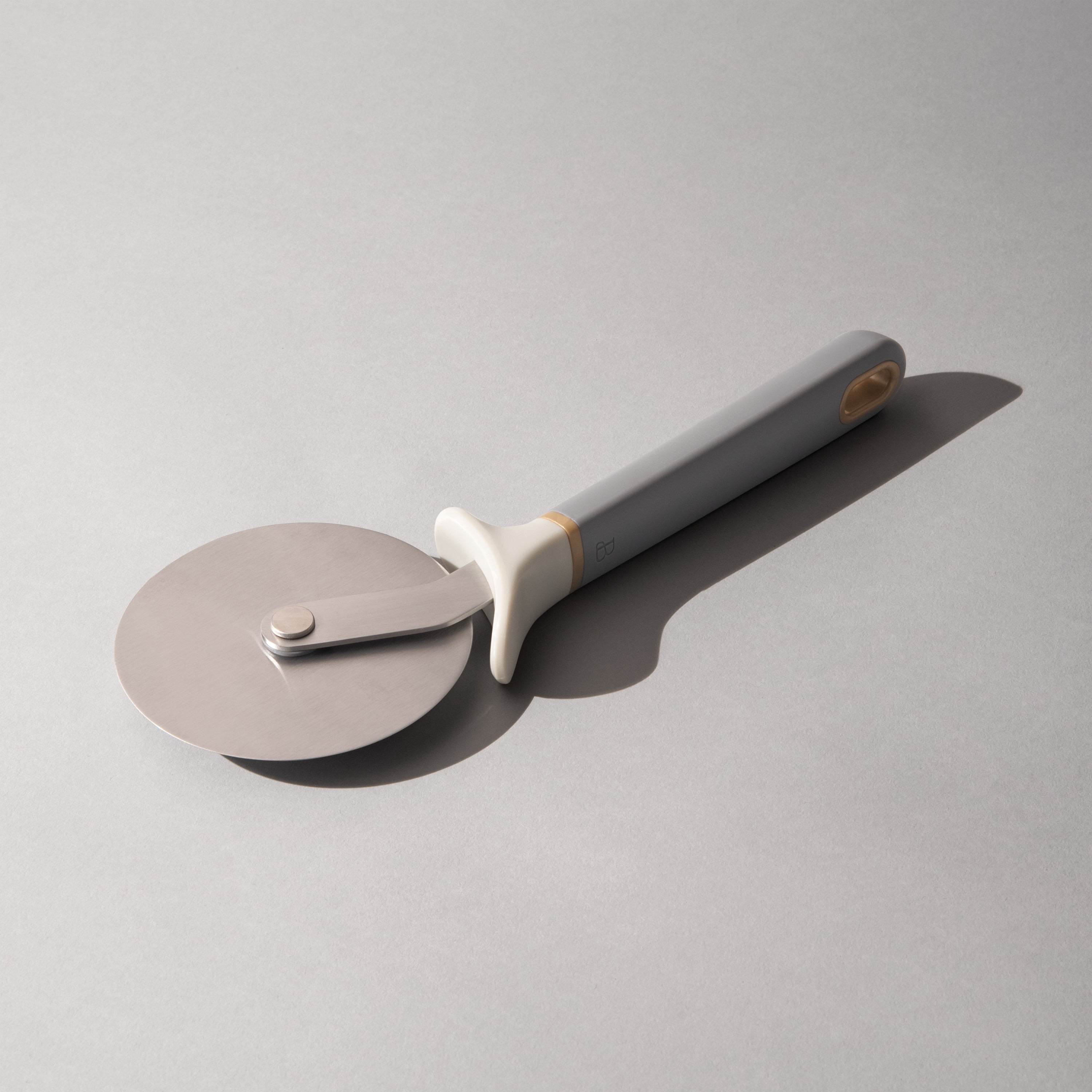 Beautiful Pizza Cutter with Stainless Steel Wheel in Grey Smoke by Drew Barrymore