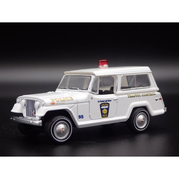 Open Box 1969 KAISER JEEP JEEPSTER TOLEDO, OHIO POLICE DEPT 1:64 SCALE DIECAST MODEL CAR