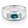 thumbnail image 2 of Gem Stone King Men's 925 Sterling Silver London Blue Topaz and White Created Sapphire Ring (1.46 Cttw, Gemstone November Birthstone, Oval 8X6MM,) (Size 11), 2 of 3