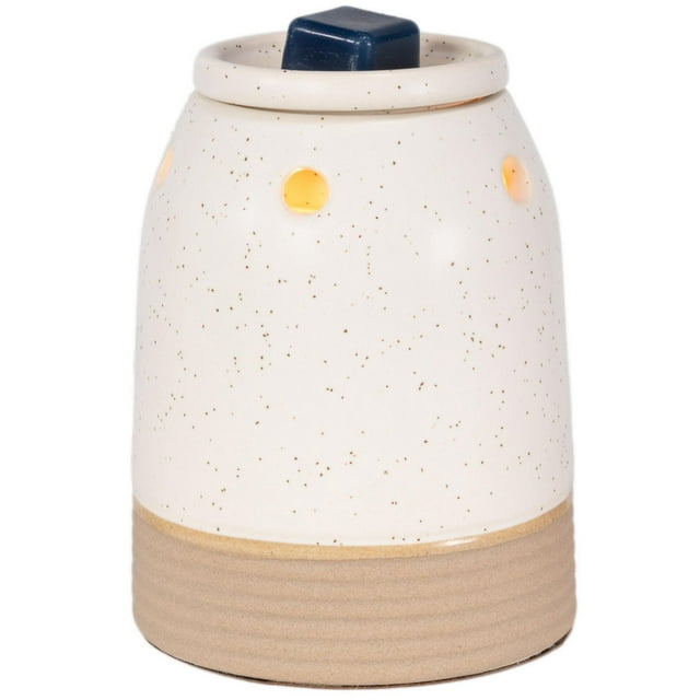 ScentSationals midsize ceramic warmer in speckled white with a beige ribbed base and glowing circular vents.