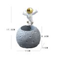 thumbnail image 2 of Portalápices de resina con tema espacial de astronauta, 2 of 3