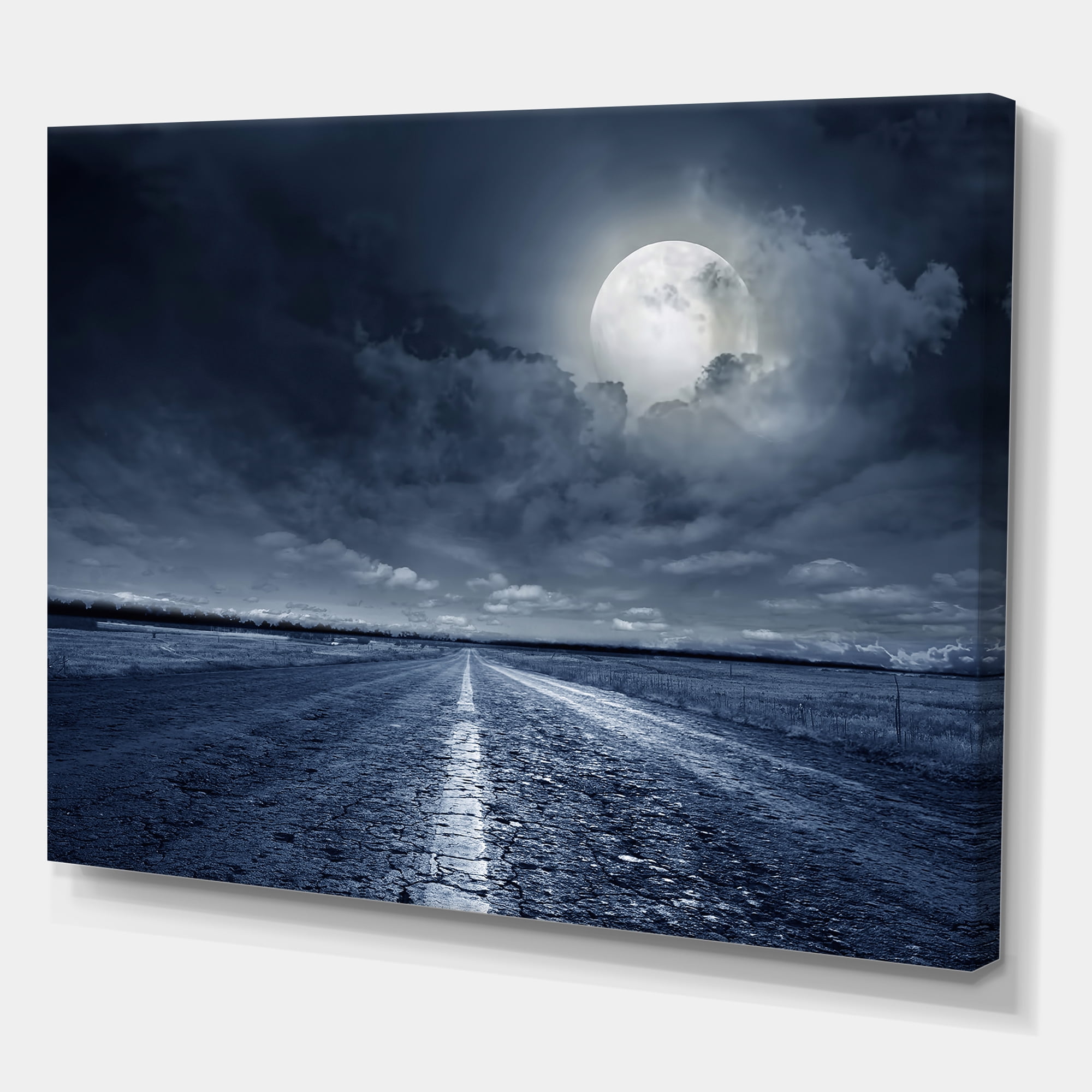 Designart ' Cloudy Full Moon Over Asphalt Road I ' Nautical & Coastal Canvas Wall Art Print