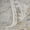 Taupe, variant on 8' X 10' Ivory Taupe and Blue Abstract Power Loom Worn Faded Area Rug With Fringe
