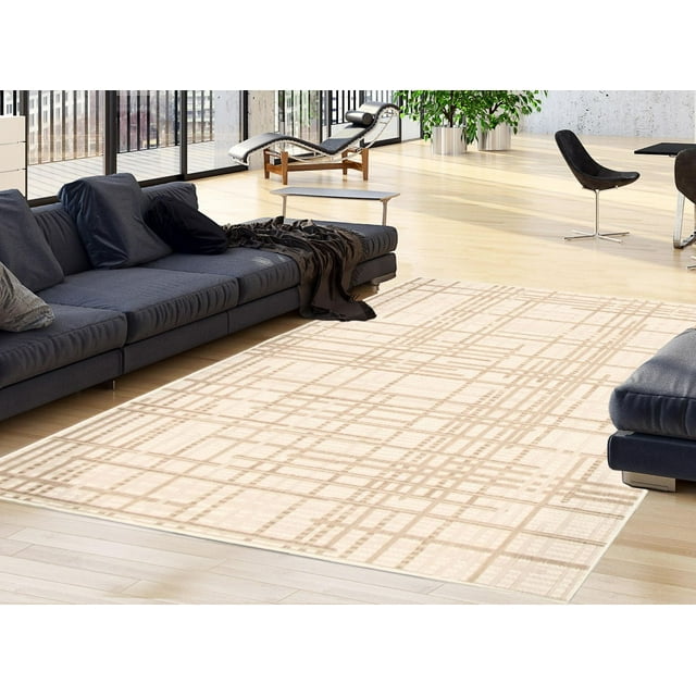 Beige and light brown plaid patterned indoor outdoor area rug from ECARPET Sisal Burburry Collection in a modern living room with dark gray sofas.