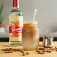 thumbnail image 2 of Torani Puremade Sirop Aromatisant Riche aux Amandes – Profil Clean-Label Amaretto et Noisette, Bouteille en Verre de Qualité Supérieure 750 ml (25,36 oz) – Vrac 12/caisse, 2 of 3