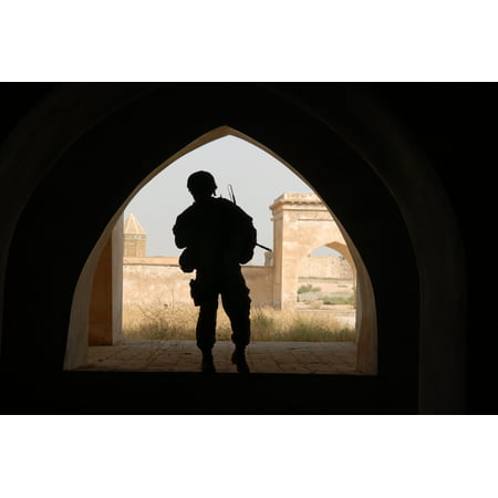 Canvas Print Army 2nd Lt. Andrew Archer is framed by an arch at the citadel in Kirkuk, Iraq, on Oct. 15, 2007. Ar Stretched Canvas 10 x