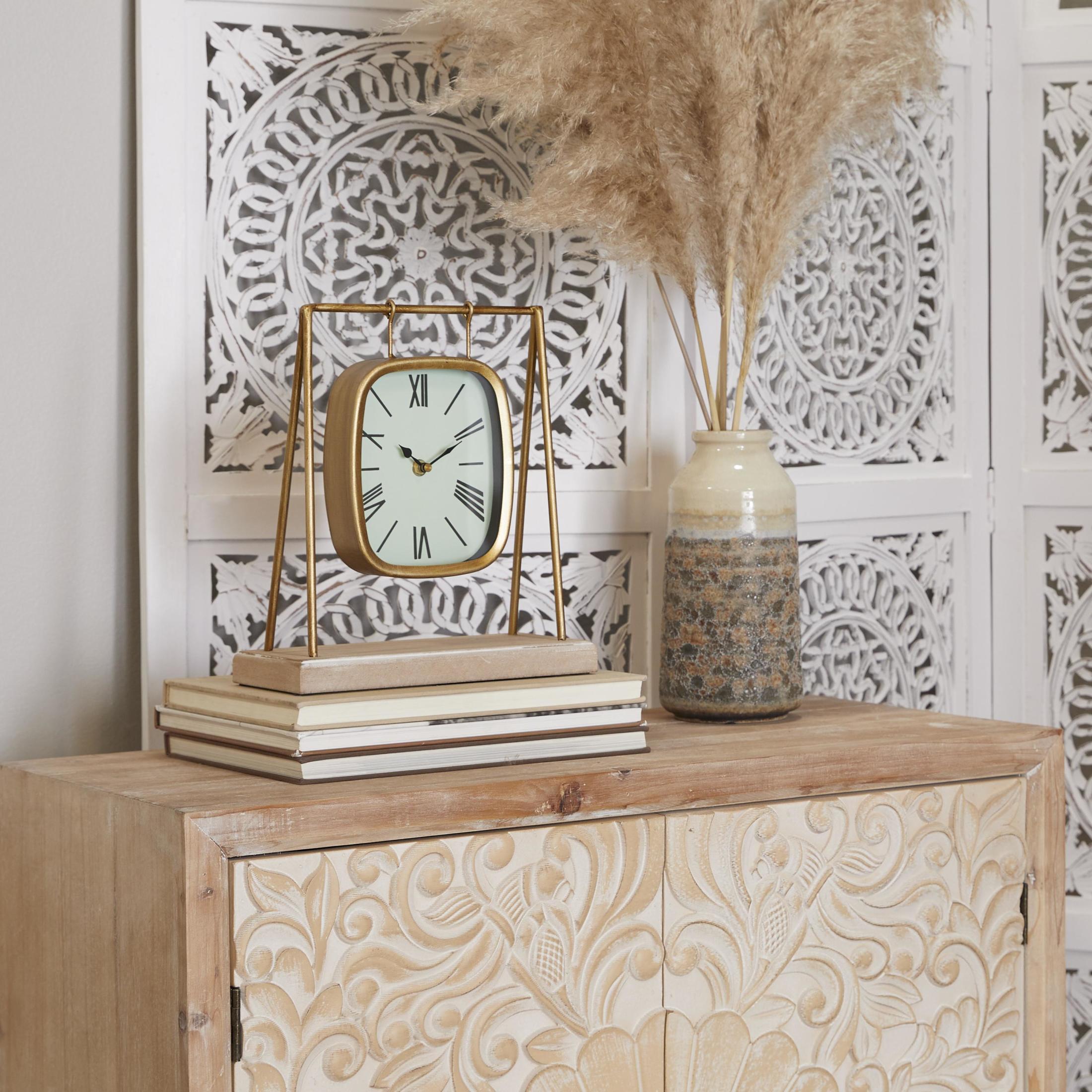 DecMode 11" Gold Metal Suspended Hanging Clock with Wood Base