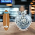 thumbnail image 6 of A rotating acrylic ornament featuring a blue and white porcelain apple with an elegant elf amidst roses symbolizing temptation on a crystal clear background, 6 of 6