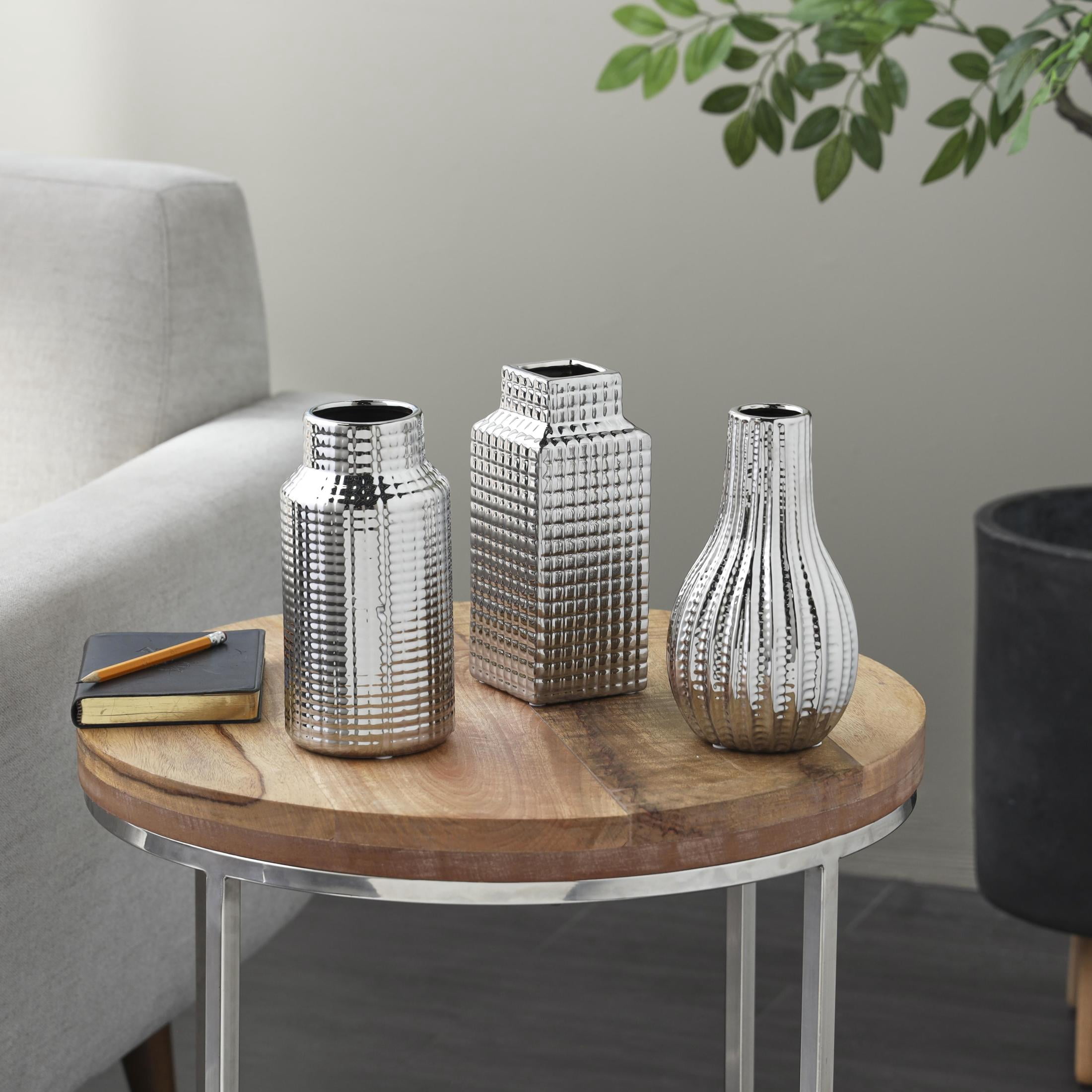 DecMode 3"W, 8"H Geometric Dimensional Textured Silver Ceramic Vase with Varying Shapes and Grid Patterns, Set of 3