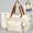 Beige, variant on Lekebobor Diaper Bag Tote, Large Diaper Bags Waterproof, Hospital Bag for Labor Delivery, Baby Bag with Pacifier Case, Travel Diaper Tote with Changing Pad, Black