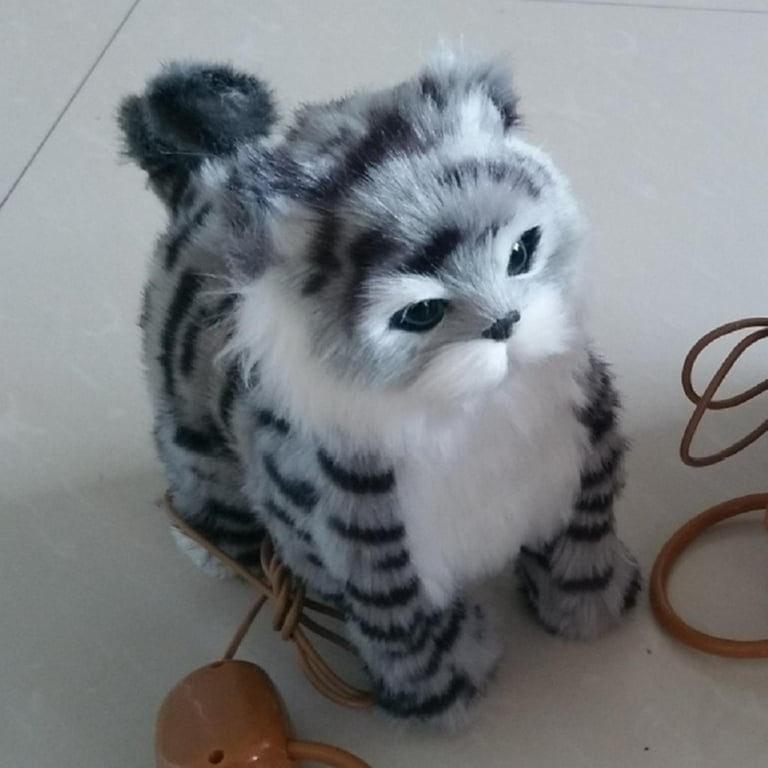 Toy kitten that walks 2025