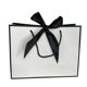 thumbnail image 1 of Bolso de mano con lazo, bolsa de papel, bolsa de ropa impresa, bolsa de regalo, bolsa de compras, bolsa de embalaje, bolsa de cosméticos, 1 of 1