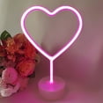 thumbnail image 1 of Lámpara de mesa LED con base redonda y diseño de corazón, ideal para decorar fiestas o espacios en casa. Luce cálida y artística, transforma cualquier ambiente aburrido en uno lleno de color., 1 of 6