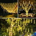 thumbnail image 3 of Asisol Christmas Lights Outdoor Meteor Shower Rain Lights, 8 Tubes 192 LEDs 12 Inch Waterproof Plug in Falling Rain String Lights for Halloween Xmas Holiday Party Home Patio Decoration, Warm White, 3 of 5