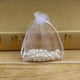 thumbnail image 4 of GOOHOCHY 50 bolsas de regalo con cordón de 10 x 15 cm, bolsas de embalaje de almacenamiento para dulces de regalo, suministros para fiestas de boda (blanco), 4 of 7