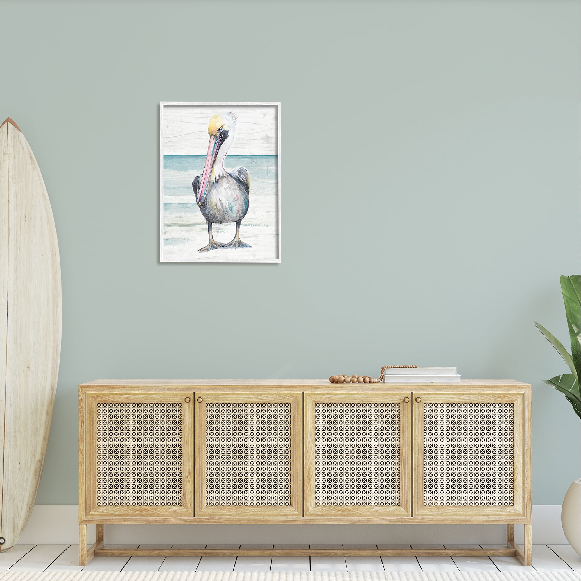 Stupell Industries Pelican Bird Standing Beach Sand Grain Pattern Graphic Art White Framed Art Print Wall Art, Design by Patricia Pinto