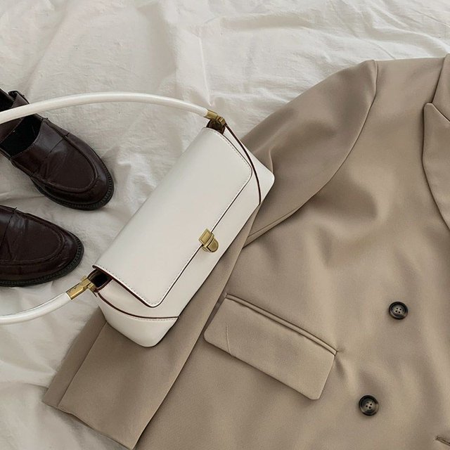 Bolso de mano de nicho francés para mujer, nuevo bolso retro de moda para debajo del brazo, bolso tipo bagel, bolso de hombro de estilo antiguo de mediana edad