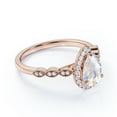 thumbnail image 3 of JeenMata 1.25 Carat Pear Shaped Blue Moonstone and Moissanite Halo Art Deco Engagement Ring in 18k Rose Gold over Silver, 3 of 6
