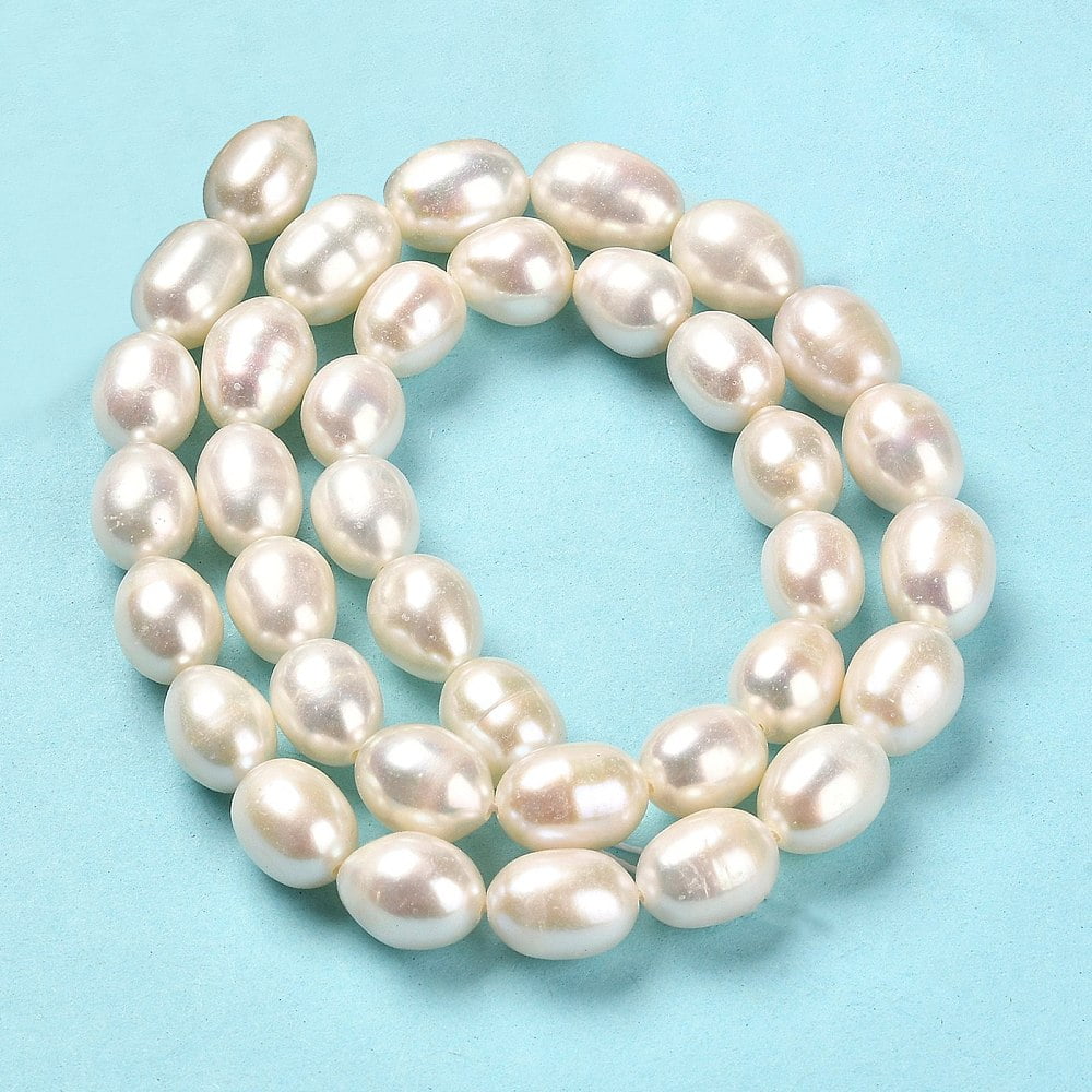 1strand Natural Cultured Freshwater Pearl Beads Strands Rice Grade AAAAA Seashell color 9.5~10x8~9mm Hole: 0.6mm about 37~38pcs/strand 14.76~15.16inch